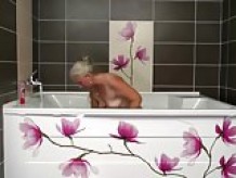 Old mom takes young cock in bathroom
